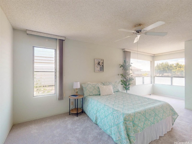 94-1036 Leomana Pl, Waipahu, HI 96797 - carpeted bedroom featuring multiple windows, a textured ceiling, and ceiling fan