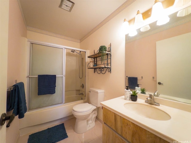 94-1036 Leomana Pl, Waipahu, HI 96797 - full bathroom featuring toilet, vanity, bath / shower combo with glass door, tile patterned flooring, and ornamental molding