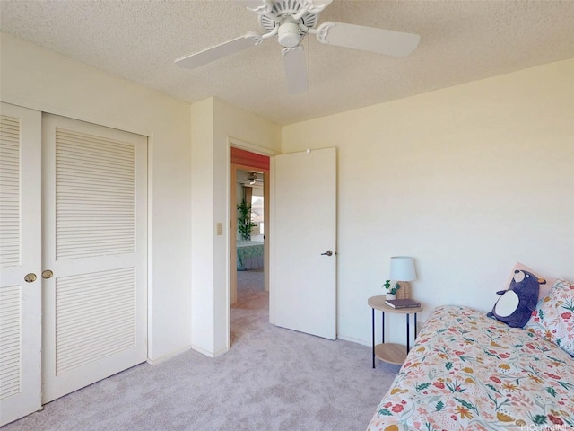 94-1036 Leomana Pl, Waipahu, HI 96797 - carpeted bedroom featuring a closet, ceiling fan, and a textured ceiling