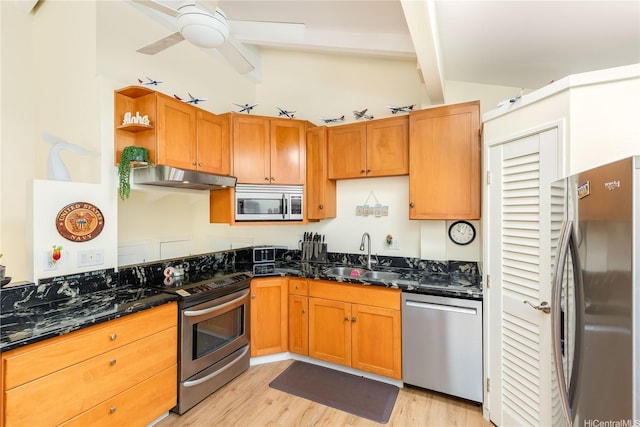 1441 Honokahua St, Honolulu, HI 96825 - kitchen featuring appliances with stainless steel finishes, a sink, under cabinet range hood, light wood-style flooring, and ceiling fan