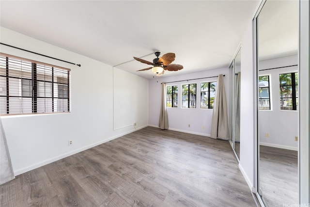 91-1011 Aeoia St Unit A, Ewa Beach, HI 96706 - spare room featuring a ceiling fan, light wood finished floors, and baseboards