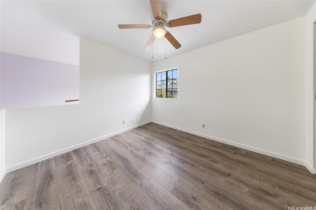 91-1011 Aeoia St Unit A, Ewa Beach, HI 96706 - spare room featuring baseboards, wood finished floors, and a ceiling fan