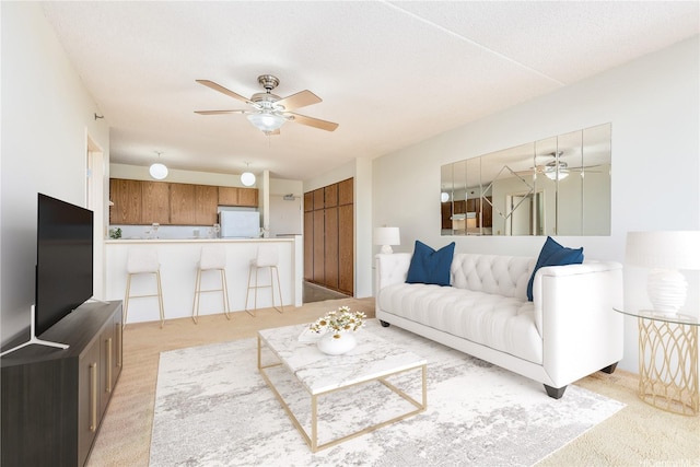 98-402 Koauka Loop Unit 1503, Aiea, HI 96701 - living area featuring ceiling fan and light colored carpet