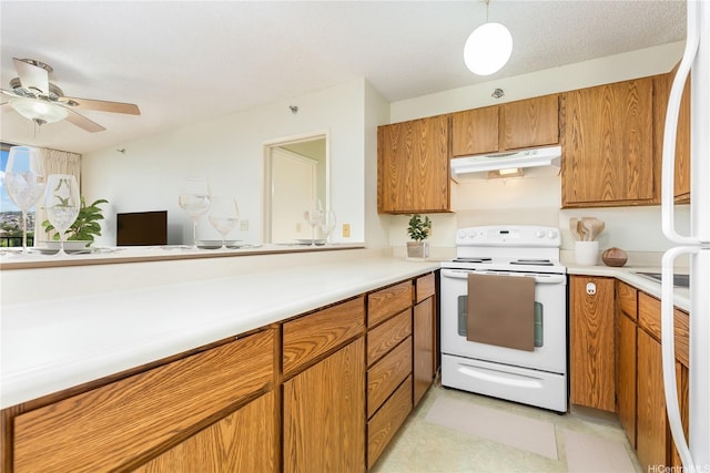 98-402 Koauka Loop Unit 1503, Aiea, HI 96701 - kitchen featuring white appliances, under cabinet range hood, brown cabinetry, and light countertops