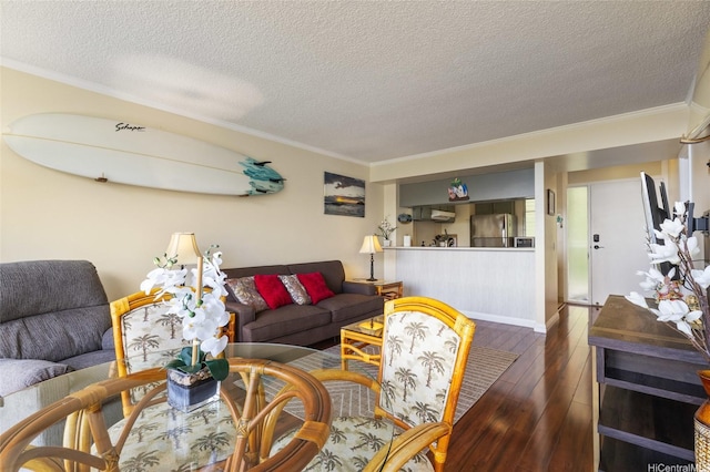 84-740 Kili Dr Unit G1626, Waianae, HI 96792 - living area with wood-type flooring, crown molding, a textured ceiling, and baseboards