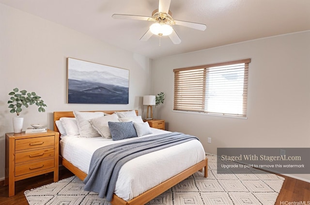 91-1066 Lanakoi St, Kapolei, HI 96707 - bedroom with wood finished floors and ceiling fan