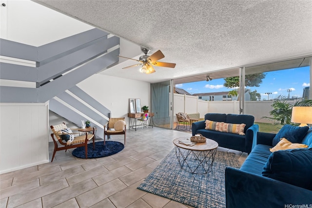 95-112 Kipapa Dr Unit 418, Mililani, HI 96789 - living room with ceiling fan, a textured ceiling, and stairway