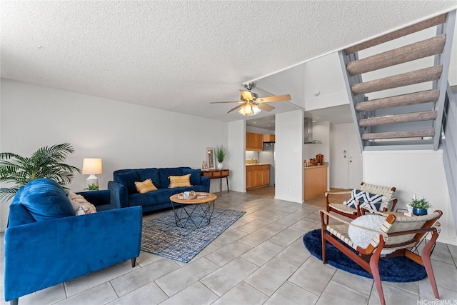 95-112 Kipapa Dr Unit 418, Mililani, HI 96789 - living area with a textured ceiling, a ceiling fan, light tile patterned floors, and stairway