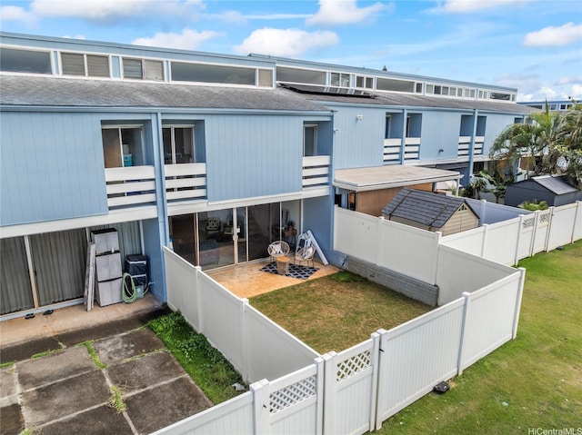 95-112 Kipapa Dr Unit 418, Mililani, HI 96789 - view of building exterior featuring a fenced backyard