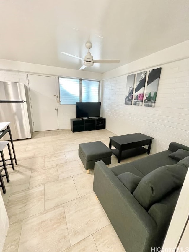 410 Nahua St Unit 106, Honolulu, HI 96815 - living area featuring ceiling fan and brick wall