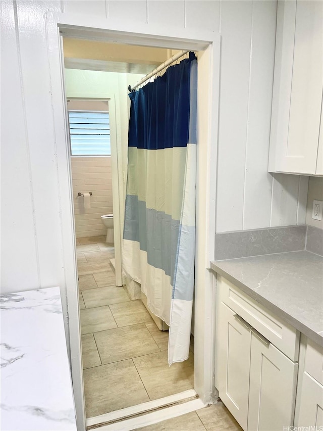 410 Nahua St Unit 106, Honolulu, HI 96815 - bathroom with toilet and curtained shower