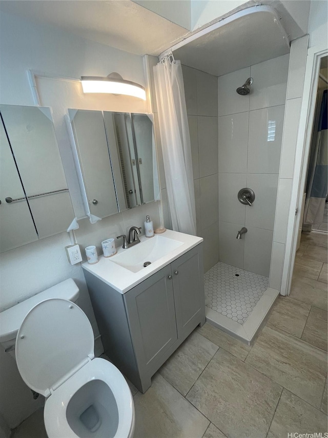 410 Nahua St Unit 106, Honolulu, HI 96815 - full bath with tiled shower, vanity, and toilet