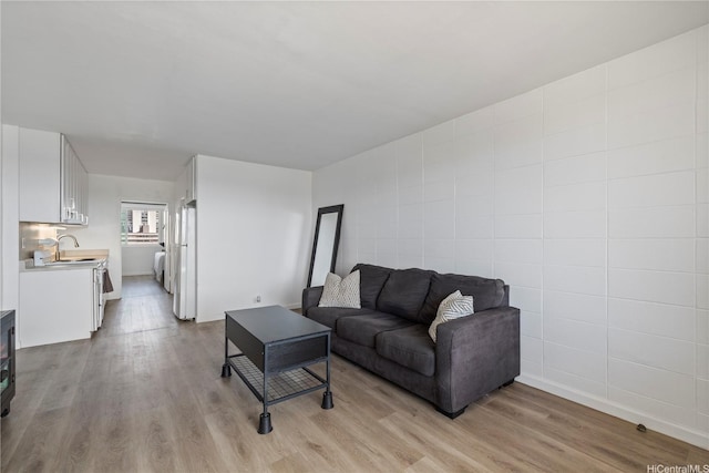1710 Makiki St Unit 1005, Honolulu, HI 96822 - living area featuring light wood-style floors