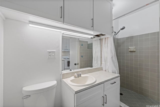 1710 Makiki St Unit 1005, Honolulu, HI 96822 - full bathroom featuring a shower stall, toilet, and vanity