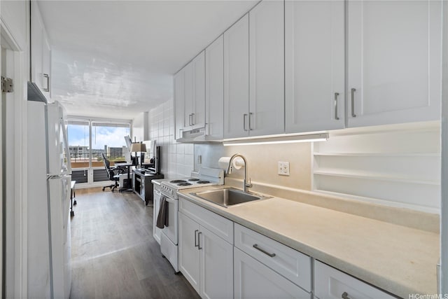 1710 Makiki St Unit 1005, Honolulu, HI 96822 - kitchen featuring a sink, white appliances, white cabinetry, and dark wood-style floors