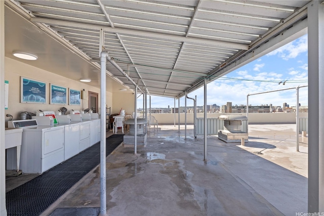 1710 Makiki St Unit 1005, Honolulu, HI 96822 - view of patio / terrace featuring washer and dryer