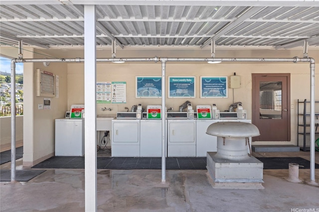 1710 Makiki St Unit 1005, Honolulu, HI 96822 - miscellaneous room with separate washer and dryer, unfinished concrete floors, and a garage