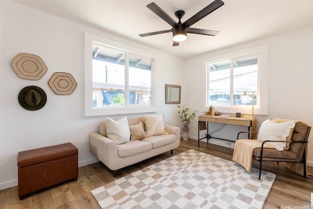 91-1327 Imelda St, Ewa Beach, HI 96706 - living room with light wood-type flooring, baseboards, and a ceiling fan