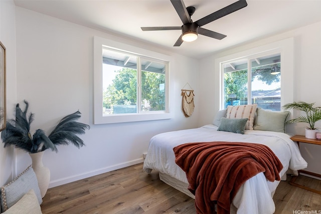91-1327 Imelda St, Ewa Beach, HI 96706 - bedroom with light wood-style flooring, baseboards, and a ceiling fan