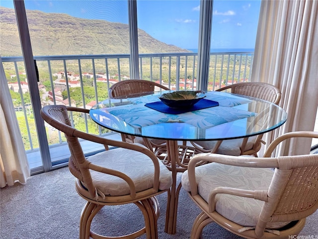 84-680 Kili Dr Unit 1001, Waianae, HI 96792 - dining room featuring carpet flooring and a mountain view