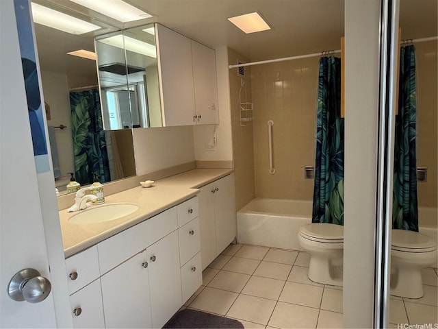 84-680 Kili Dr Unit 1001, Waianae, HI 96792 - full bathroom featuring toilet, tile patterned flooring, vanity, and shower / bath combo with shower curtain