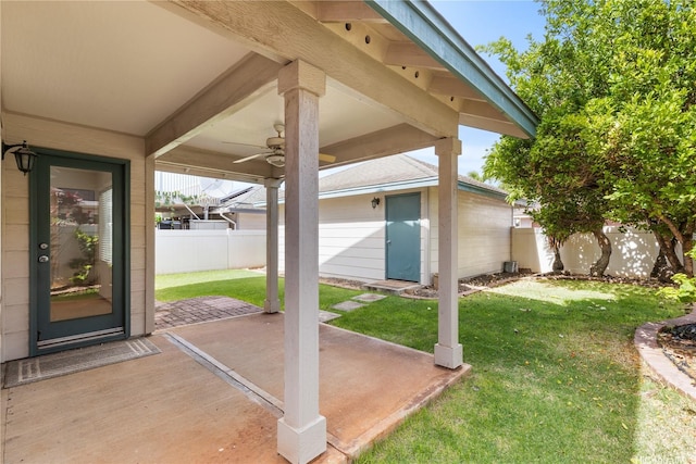 91-1022 Kaikauhaa St, Ewa Beach, HI 96706 - view of yard featuring ceiling fan, a patio, and an outdoor structure