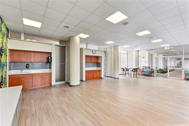 500 University Ave Unit 509, Honolulu, HI 96826 - miscellaneous room featuring a sink and light wood-style flooring