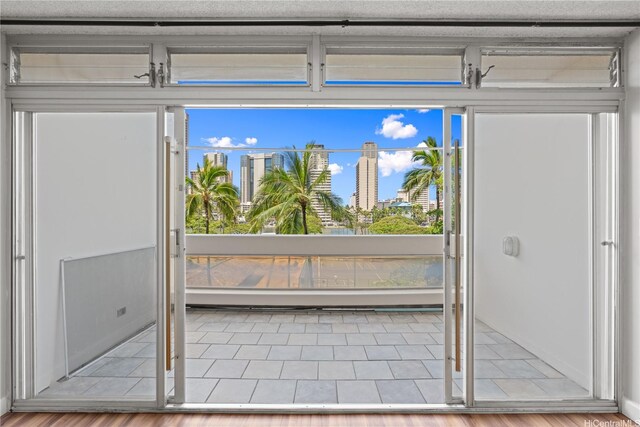 500 University Ave Unit 509, Honolulu, HI 96826 - doorway featuring tile patterned flooring and plenty of natural light