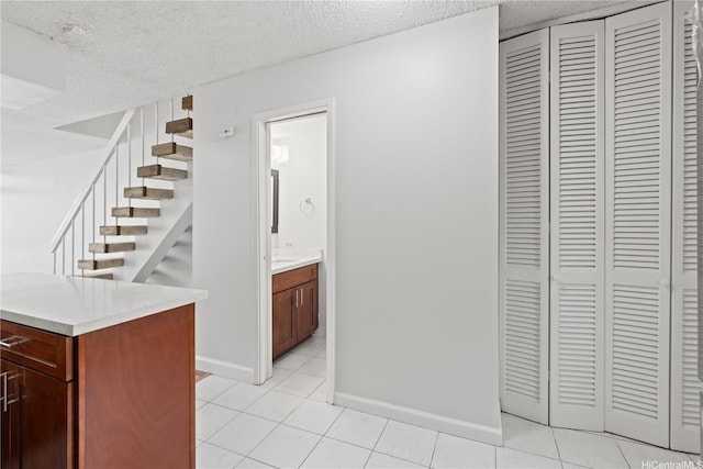 500 University Ave Unit 509, Honolulu, HI 96826 - interior space with a textured ceiling, tile patterned floors, and baseboards