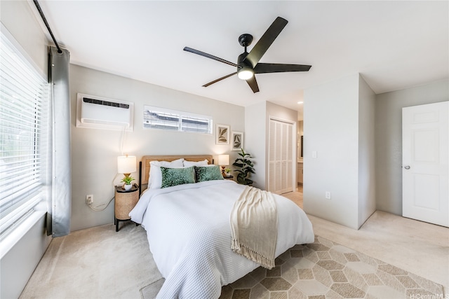 91-208 Kekepania Pl Unit B, Kapolei, HI 96707 - bedroom featuring multiple windows, a wall mounted air conditioner, light colored carpet, and a closet