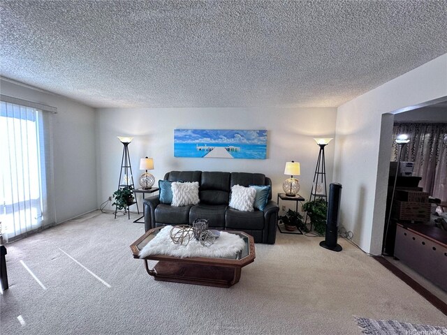 94-070 Akualele Pl, Mililani, HI 96789 - living room featuring carpet flooring and a textured ceiling