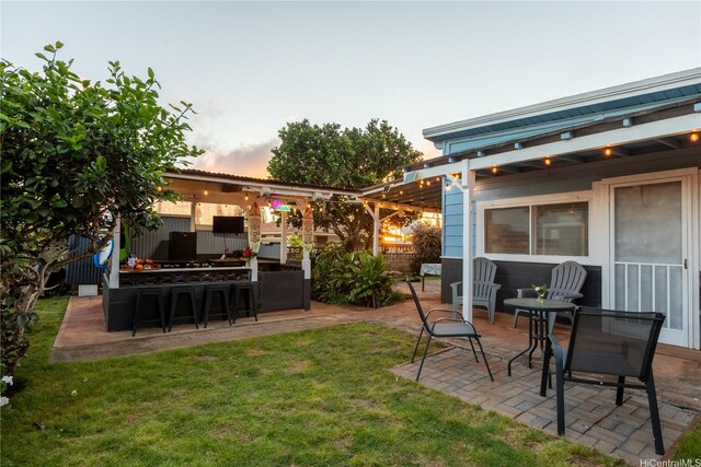 538 Akahi Pl, Lanai City, HI 96763 - view of green lawn with a patio area