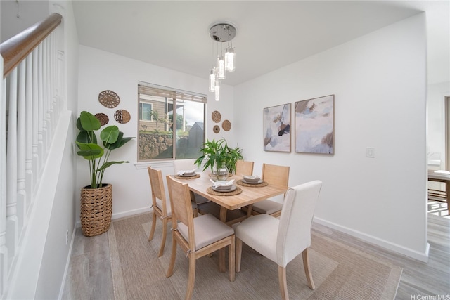 92-735 Welo St, Kapolei, HI 96707 - dining space with light wood-style floors and baseboards