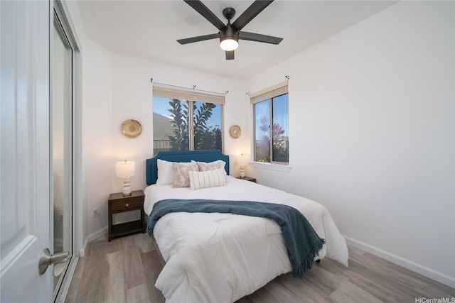 92-735 Welo St, Kapolei, HI 96707 - bedroom featuring light wood finished floors, baseboards, ceiling fan, and a closet
