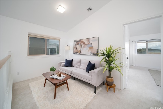 92-735 Welo St, Kapolei, HI 96707 - living area featuring carpet floors and vaulted ceiling