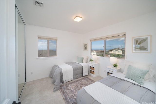 92-735 Welo St, Kapolei, HI 96707 - bedroom featuring light carpet