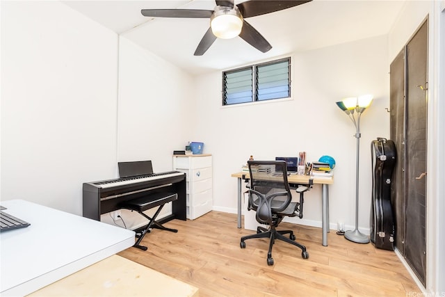 1005 Ala Lilikoi St Unit W201, Honolulu, HI 96818 - home office featuring light wood-style floors, ceiling fan, and baseboards