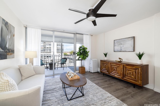475 Atkinson Dr Unit 608, Honolulu, HI 96814 - living area featuring a ceiling fan, wood finished floors, and expansive windows