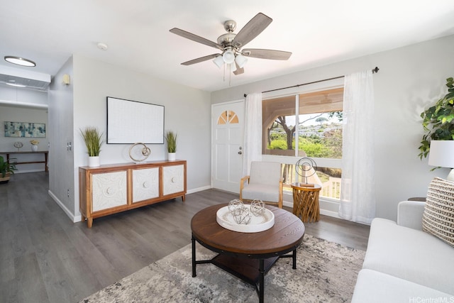 92-1151 Palahia St Unit B206, Kapolei, HI 96707 - living area with wood finished floors, ceiling fan, and baseboards
