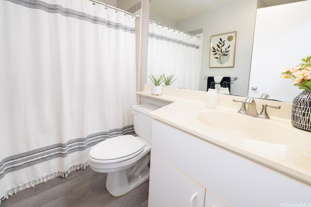 92-1151 Palahia St Unit B206, Kapolei, HI 96707 - bathroom featuring toilet, vanity, wood finished floors, and a shower with shower curtain