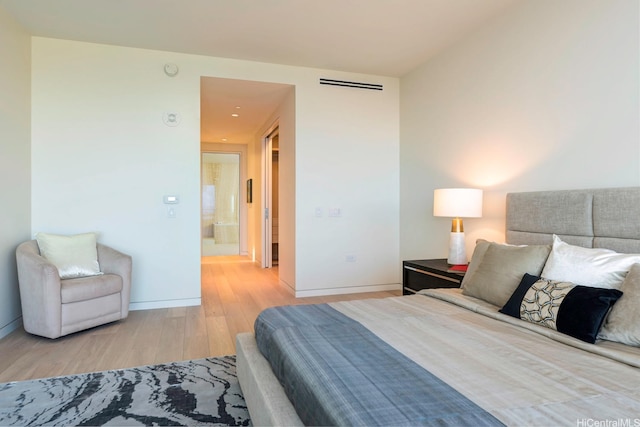 1118 Ala Moana Blvd Unit 1000, Honolulu, HI 96814 - bedroom with wood finished floors and baseboards