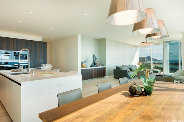 1118 Ala Moana Blvd Unit 1000, Honolulu, HI 96814 - dining area with recessed lighting and light wood-style floors