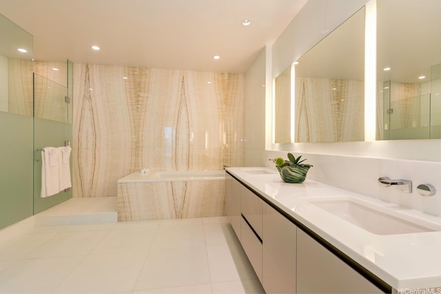 1118 Ala Moana Blvd Unit 1000, Honolulu, HI 96814 - bathroom featuring a garden tub, double vanity, recessed lighting, a shower, and tile patterned floors