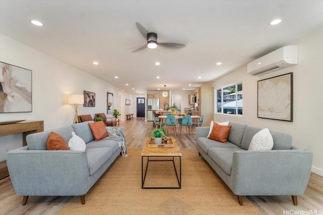 1504 Ainakoa Ave, Honolulu, HI 96821 - living room with a wall mounted air conditioner, light wood-type flooring, a ceiling fan, and recessed lighting