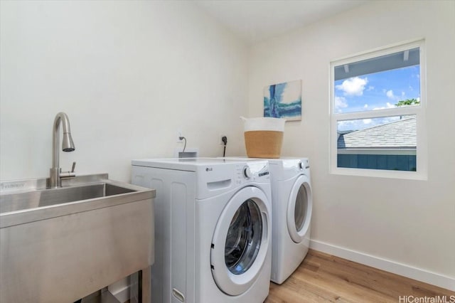 1504 Ainakoa Ave, Honolulu, HI 96821 - laundry area with washer and dryer, baseboards, and light wood-type flooring