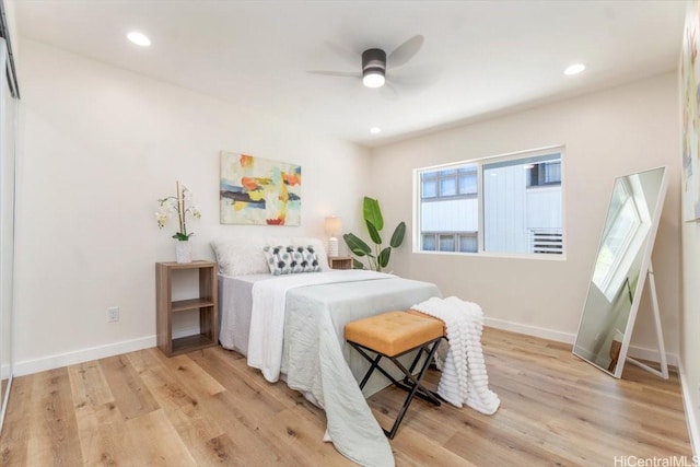 1504 Ainakoa Ave, Honolulu, HI 96821 - bedroom with light wood-type flooring, baseboards, recessed lighting, and ceiling fan