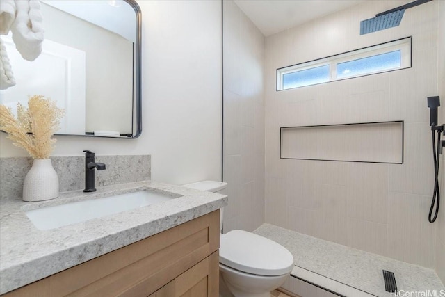 1504 Ainakoa Ave, Honolulu, HI 96821 - bathroom with toilet, a tile shower, and vanity
