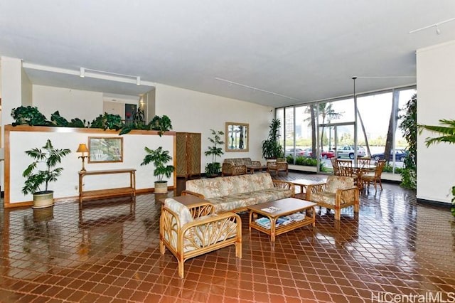 2345 Ala Wai Blvd Unit 1805, Honolulu, HI 96815 - living room with plenty of natural light and tile patterned flooring