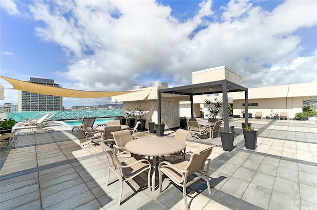 2345 Ala Wai Blvd Unit 1805, Honolulu, HI 96815 - view of patio with outdoor dining area and a pool
