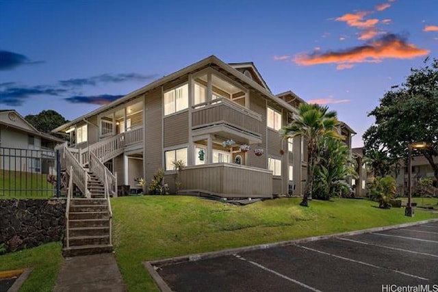 95-510 Wikao St Unit B201, Mililani, HI 96789 - view of building exterior featuring uncovered parking and stairway